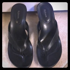 Black flip flop wedge shoe. Size 6.5